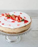 STRAWBERRY SWIRL CHEESECAKE WITH COCONUT CREAM TOPPING